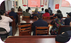 周路口司法所联合赛跑坦社区开展《中华人民共和国国家安全法》宣传活动