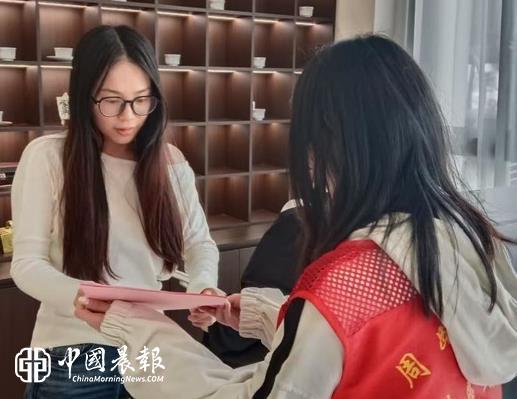云锦巷社区联合周路口司法所开展《民法典》宣传活动